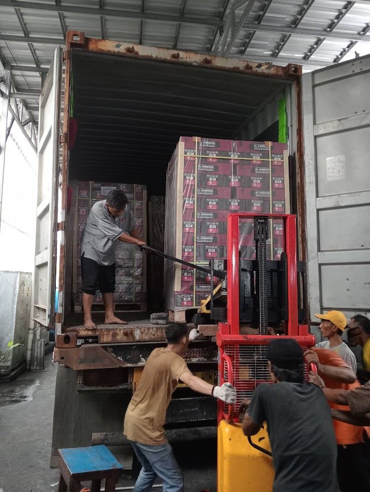 loading a container with BBQ charcoal to the UAE